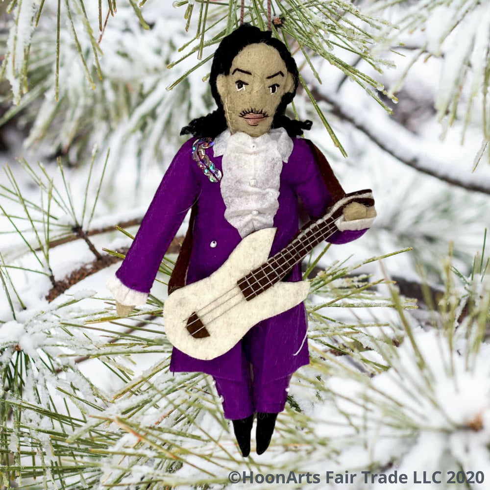 Handmade Christmas Ornament-Artist Formerly Known as Prince, dressed in purple with guitar, hanging from snow-covered pine tree