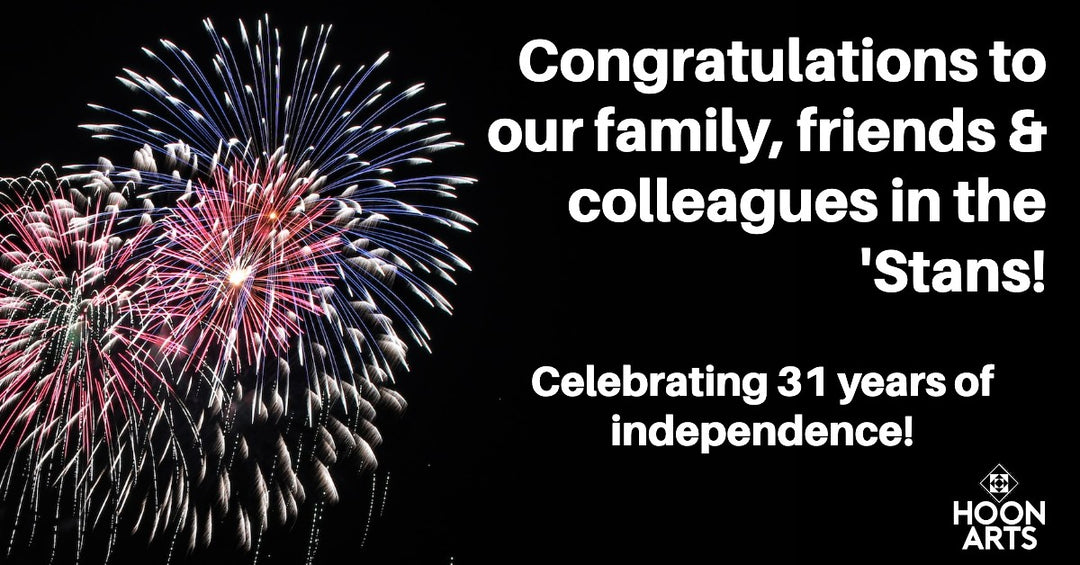 Fireworks on black background with text caption in white reading  "Congratulations to our family, friends & colleagues in the 'Stans!" Celebrating 31 years of independence", with a  white HoonArts logo in the lower right corner.