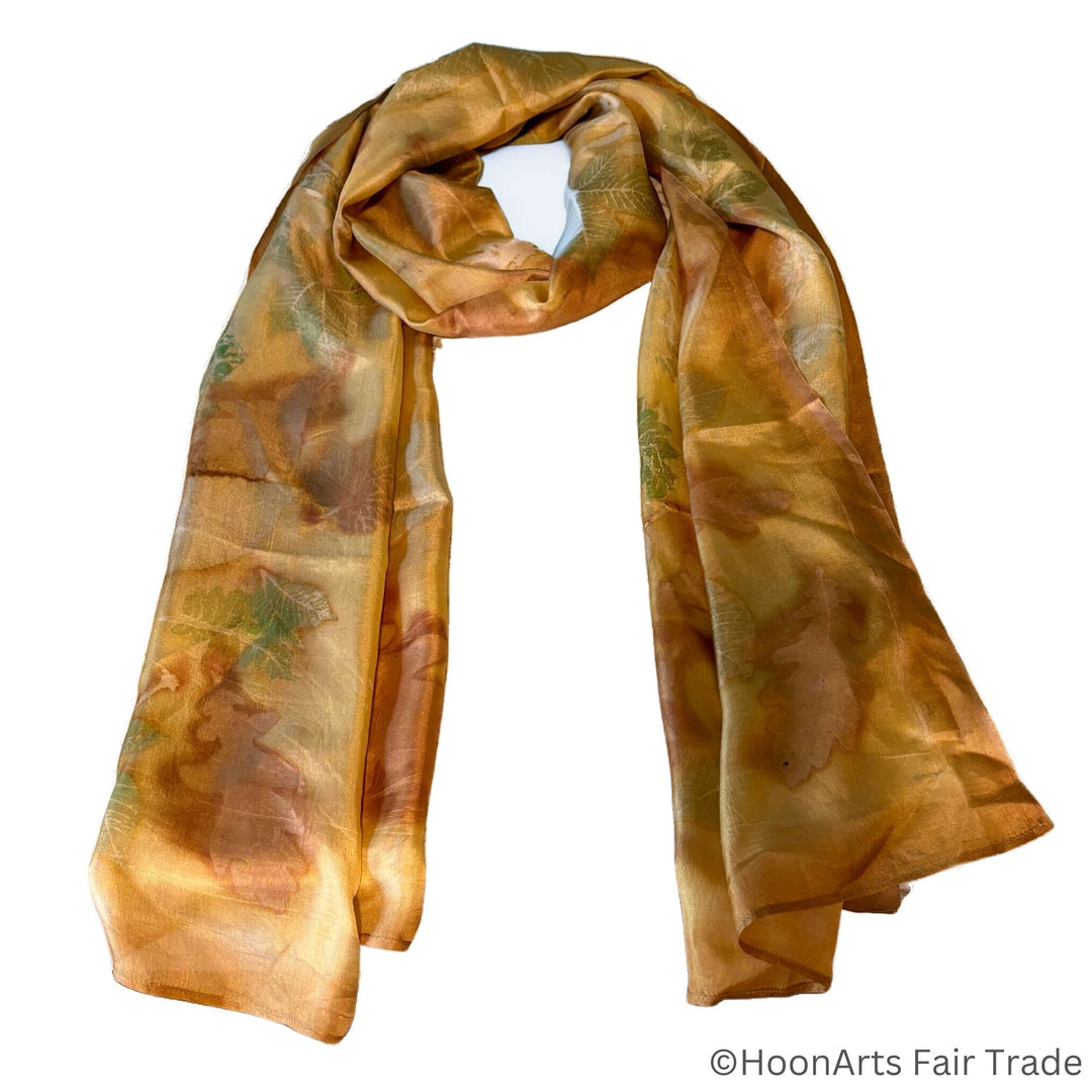 Golden Glory Eco-Printed Silk Scarf showcasing intricate botanical patterns on handwoven silk