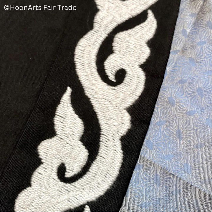 Closeup of White Hand Embroidery from Tajikistan-Vine Pattern on Cardigan Jacket