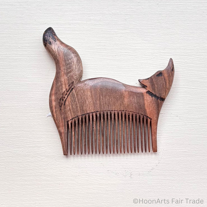 tiny fox comb handcarved using walnut wood with detailed carving design