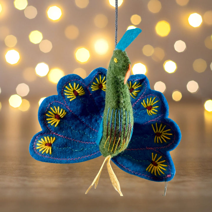 Turquoise Peacock Felt Ornament Christmas lights background