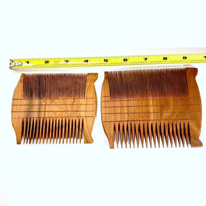 Size Comparison of Large and Small Versions of Hand-Carved Apricot Reproductions of Ancient Egyptian Two-Sided Comb