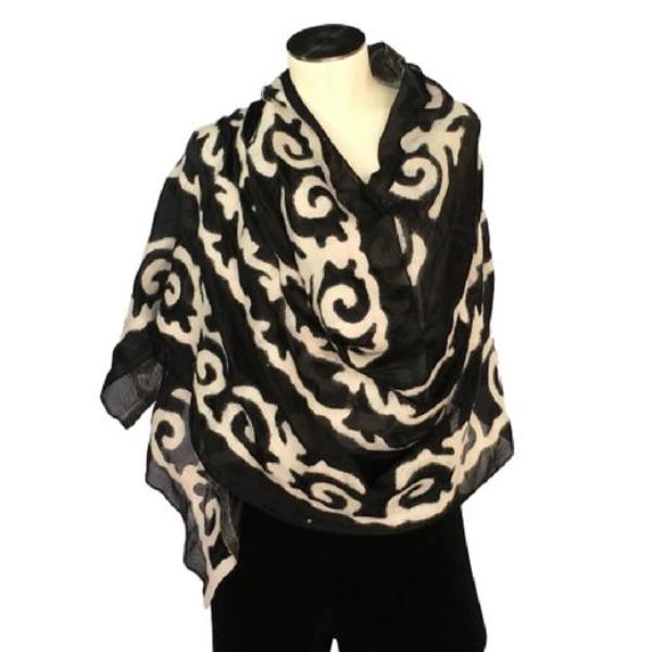 White and black Kyrgyz felted shawl with traditional patterns
