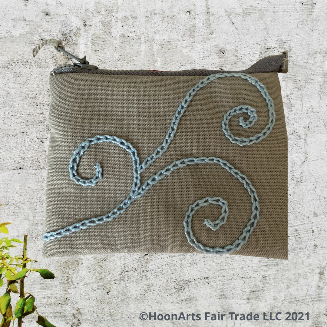 hand embroidered blue swirl pattern on grey coin purse HoonArts