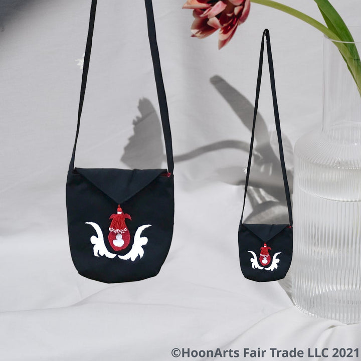 Istaravshan White & Red Embroidered Pattern On HoonArts Black Cross-Body Shoulder Bag