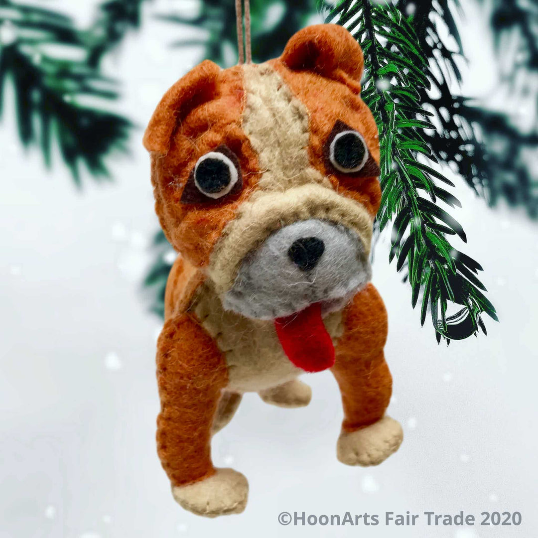 Front view of Felt Bulldog Christmas ornamanet, hanging from pine Christmas tree