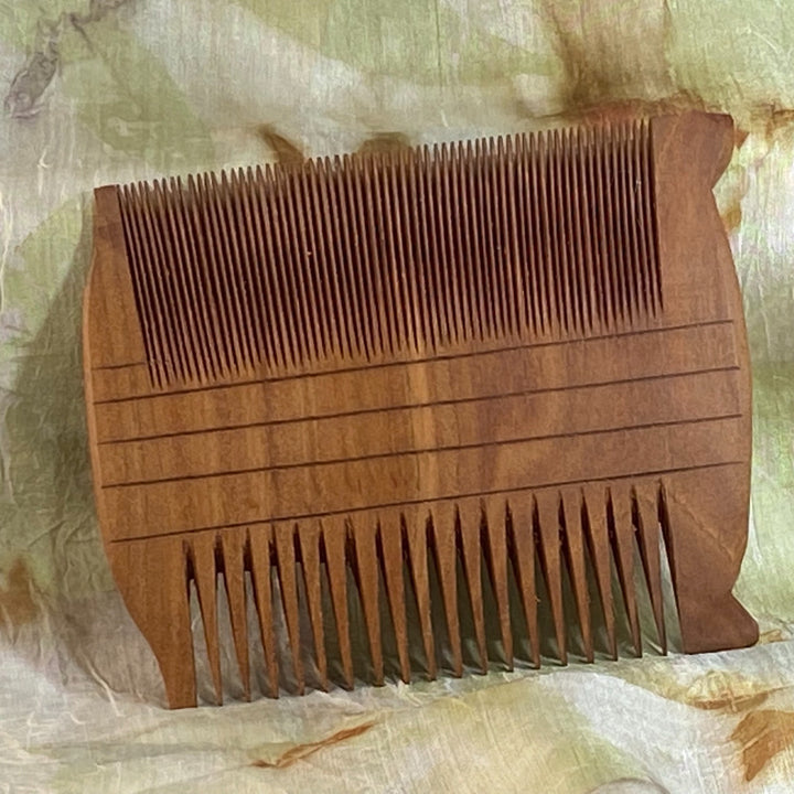 Large Ancient Egyptian Comb-Hand-Carved Reproduction  in Apricot, on Silk Background