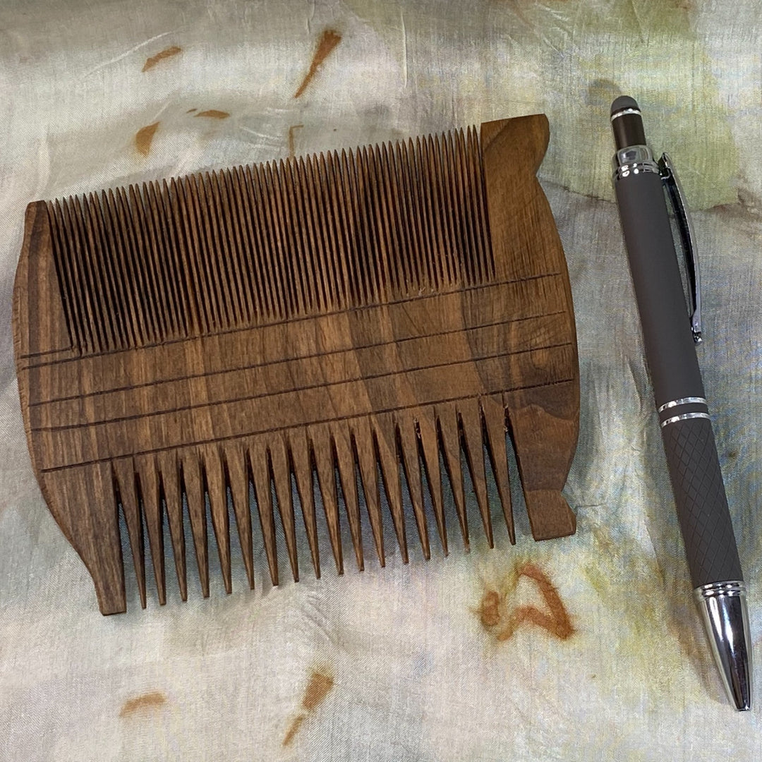 Ancient Egyptian 2-Sided Comb-Walnut Reproduction Showing Scale in Comparison to Pen