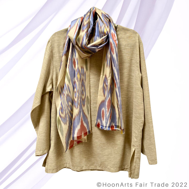 Silk Pastel Yellow Blue & Red Handwoven Ikat Scarf On top of blouse