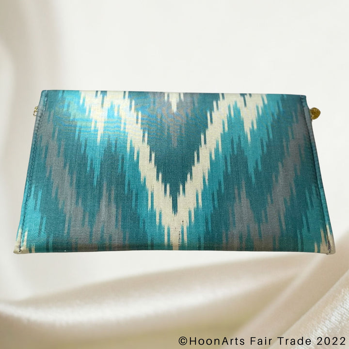 Turquoise & Grey Arrow Ikat Clutch back view