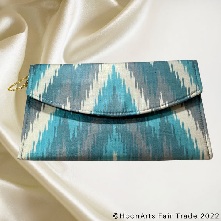 Turquoise & Grey Arrow Ikat Clutch front view
