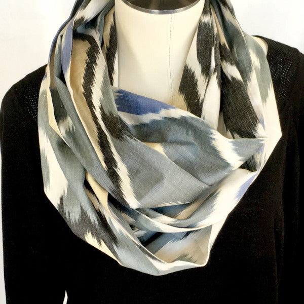 Handwoven ikat infinity scarf on mannequin-grey, black, blue, white and beige | HoonArts