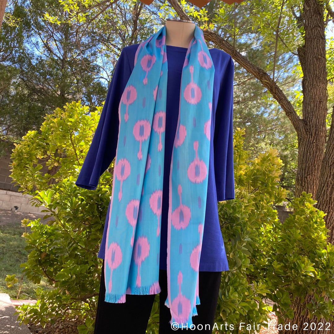 Turquoise & Pink Handwoven Ikat Scarf hanging on neck mannequin