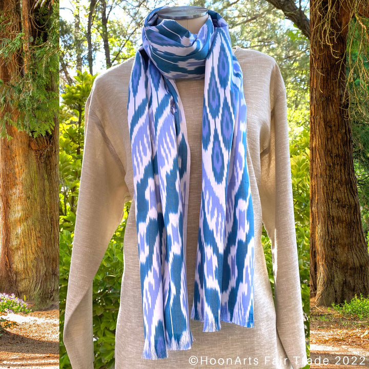 Blue, White & Teal Ikat Scarf hanging on neck mannequin