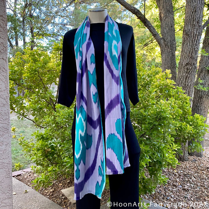 Teal & Purple Ikat Scarf hanging on neck mannequin