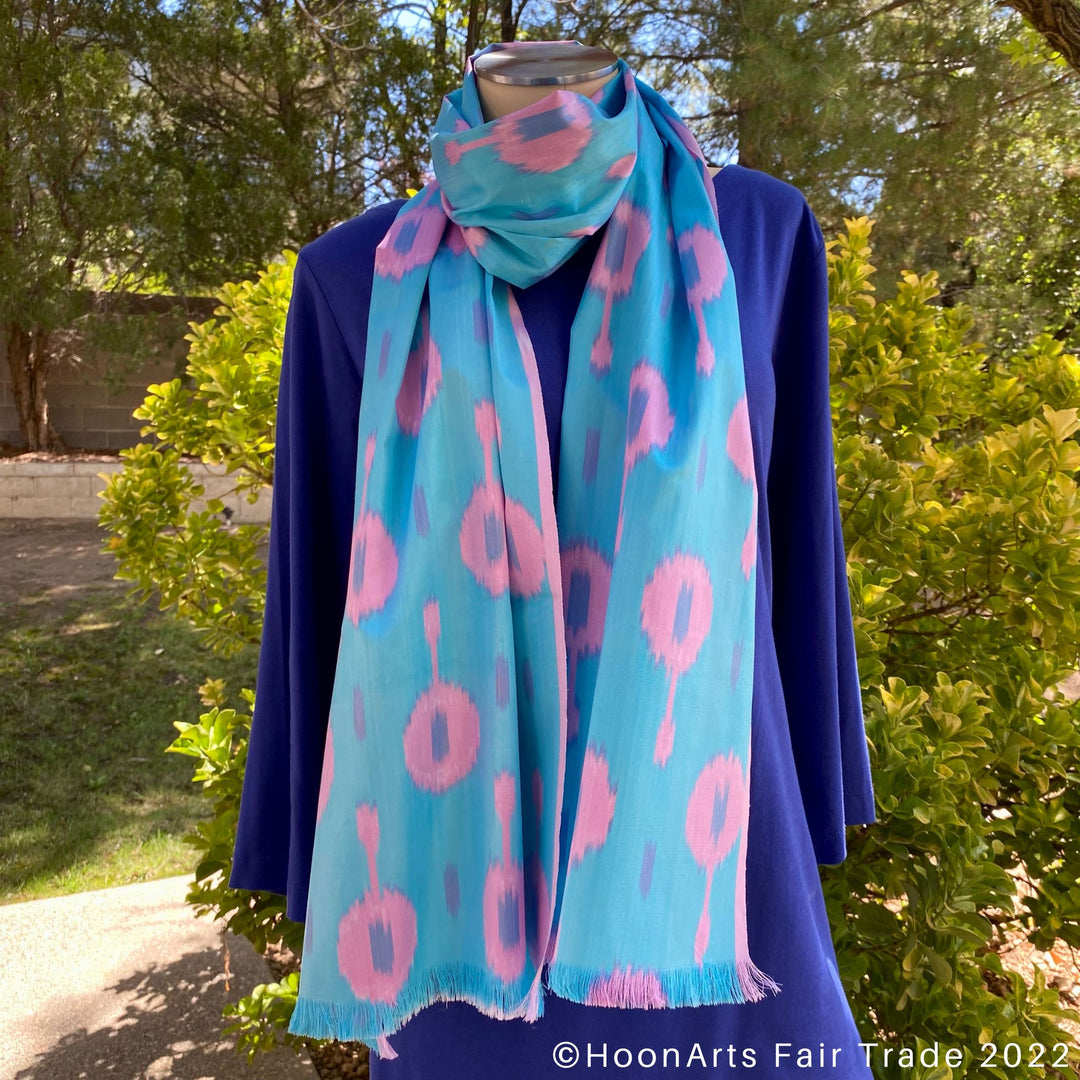 Turquoise & Pink Handwoven Ikat Scarf wrap around neck mannequin 2